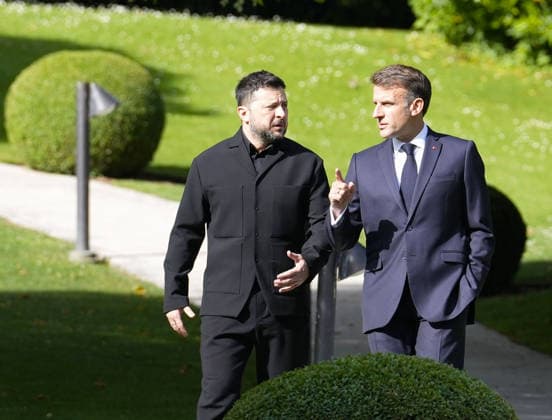 G7 summit in France Ukrainian President Volodymyr Zelenskyy (L) converses with French President Emmanuel Macron as he arrives at the venue of a Group of Seven summit in Evian-les-Bains, France, on June 16, 2026.  A14AA0005619044P