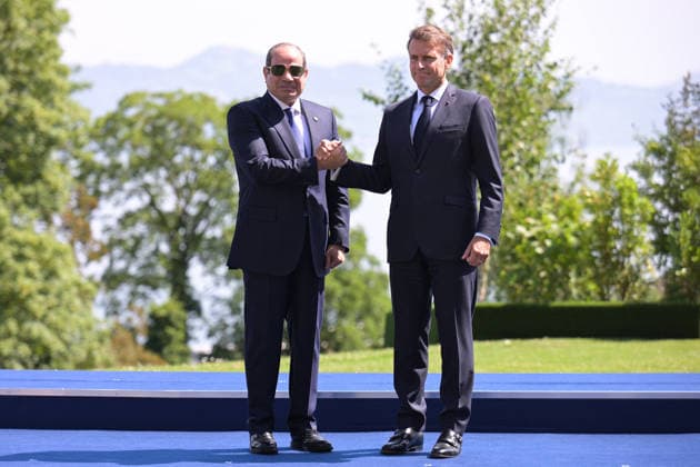 G7 Summit - Macron Welcomes El-Sisi France s President Emmanuel Macron greets Egypt s President Abdel Fattah El-Sisi for the official greeting ahead of a work lunch as part of the G7 summit, in Evian, eastern France, on June 16, 2026. A G7 summit is set to take place June 15 to 17 in the French town of Evian-les-Bains near Switzerland and it will be attended by country leaders as well as the EU s foreign policy chief and ministers from Brazil, Canada, the United Arab Emirates and Turkey. Photo by Ammar Abd Rabbo ABACAPRESS.COM Evian France  Copyright: xAbdxRabboxAmmar ABACAx