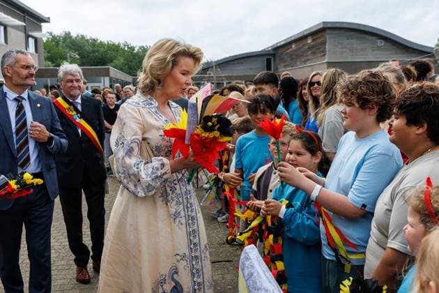 De Haan mayor Wilfried Vandaele and Queen Mathilde of Belgium pictured during a royal visit to the Zeepreventorium in De Haan, Tuesday 16 June 2026. The paediatric rehabilitation centre is specialised in supporting children and young people with chronic conditions such as cystic fibrosis and obesity and celebrates its 100th anniversary.  KURTxDESPLENTER 177847318