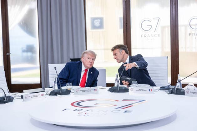 U.S. President Donald Trump and French President Emmanuel Macron during a working lunch as part of the G7 summit in Evian, eastern France, on June 16, 2026 A G7 summit is set to take place June 15–17 in the French town of Évian-les-Bains near Switzerland, and it will be attended by national leaders as well as the EU’s foreign policy chief and ministers from Brazil, Canada, the United Arab Emirates, and Turkey Ammar Abd Rabbo Pool Bestimage Évian-les-Bains, France,detected_source_language  Copyright: xAmmarxAbdxRabbo Pool BestimagexAmmarxAbdxRabbo Pool Bestimagex