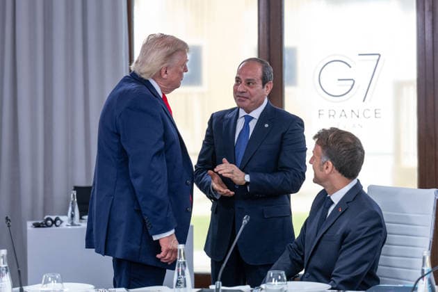 U.S. President Donald Trump speaks with Egypt’s President Abdel Fattah al-Sisi and France’s President Emmanuel Macron during a working lunch as part of the G7 summit in Evian, eastern France, on June 16, 2026. A G7 summit is scheduled to take place June 15–17 in the French town of Évian-les-Bains near Switzerland, and it will be attended by national leaders as well as the EU’s foreign policy chief and ministers from Brazil, Canada, the United Arab Emirates, and Turkey. Ammar Abd Rabbo Pool Bestimage Évian-les-Bains, France,detected_source_language  Copyright: xAmmarxAbdxRabbo Pool BestimagexAmmarxAbdxRabbo Pool Bestimagex