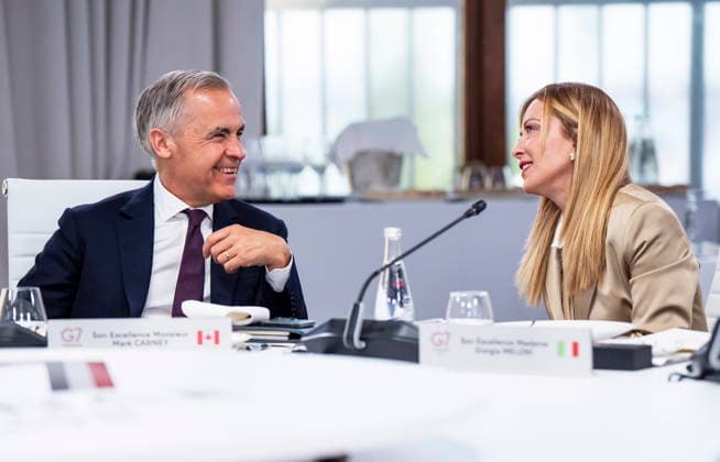 June 16, 2026, Evian-Les-Bains, France: CanadaöÄÃ s Prime Minister Mark Carney and Prime Minister of Italy, Giorgia Meloni speak at the G7 working luncheon, during the G7 summit in Evian-les-Bains, France, on Tuesday, June 16, 2026. Evian-Les-Bains France  - ZUMAc35_ 20260616_zaf_c35_029 Copyright: xChristopherxKatsarovx