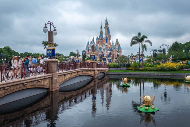 SHANGHAI, CHINA - JUNE 16: Visitors walk through Shanghai Disney Resort on June 16, 2026 in Shanghai, China. The theme park is celebrating its 10th anniversary since opening, having received over 100 million visits cumulatively.  Copyright: xVCGx 111648625108