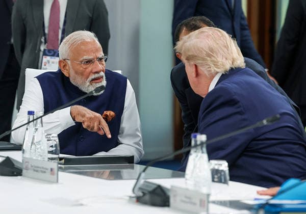 RECORD DATE NOT STATED PM Modi interacts with US President Donald Trump at the G7 Summit Evian, France , Jun 16 (ANI): Prime Minister Narendra Modi interacts with US President Donald Trump at the G7 Summit, in Evian on Tuesday. (@narendramodi X ANI Photo) Evian France Copyright: xANIx ANI_20260616408