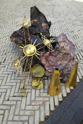 An old gilded cross, deformed by the blast wave, and pieces of burnt metal plating lie on the ground outside the Dormition Cathedral at the Kyiv Pechersk Lavra, which was hit by a Russian drone during a massive attack on the Ukrainian capital on Monday night, June 15, Kyiv, Ukraine, June 16, 2026. The strike triggered a large-scale fire that covered about 800 sq m and damaged 80% of the roof structure. (Photo by Yuliia Ovsiannikova Ukrinform) Briefing on aftermath of Russian attack on cultural heritage sites of Kyiv  Copyright: xYuliiaxOvsiannikovax