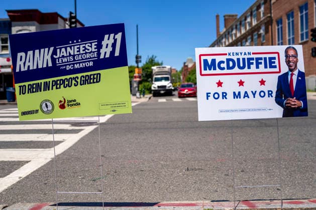 Posters for DC primary election candidates are seen outside the Prince Hall Masonic Temple as people vote in Washington DC s 2026 primary elections on Tuesday, June 16, 2026. The two front-runners to succeed current DC Mayor Muriel Bowser are Kenyan McDuffie, a moderate with support from many of Bowser s cabinet, and Janeese Lewis George, democratic socialist who built her campaign around organized labor.  WAP20260616330 BONNIExCASH