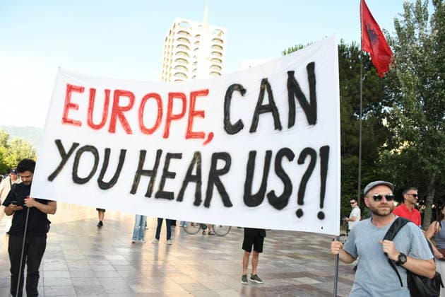 Protesters rally against tourism project in Albania TIRANA, ALBANIA - JUNE 16: People take part in a protest against a planned tourism project in the Zvernec area of the coastal city of Vlora, in Tirana, Albania, on June 16, 2026. Demonstrators gathered in Skanderbeg Square under the slogan Albania is not for sale as protests entered their 17th day. Protesters opposed the planned sale of a beach in Zvernec as part of a tourism project reportedly linked to Ivanka Trump and Jared Kushner. Carrying banners, placards and Albanian flags, demonstrators marched along the Boulevard of the Martyrs of the Nation toward the Prime Minister’s Office. Olsi Shehu Anadolu Tirana Albania. Editorial use only. Please get in touch for any other usage.  Copyright: x2026xAnadoluxOlsixShehux