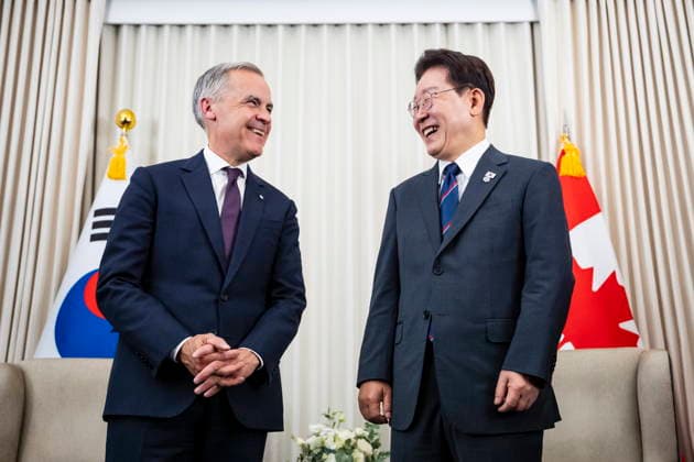 June 16, 2026, Evian-Les-Bains, France: Canadian Prime Minister Mark Carney, left, meets with Lee Jae Myung, president of South Korea, during the G7 summit in Evian-les-Bains, France, on Tuesday, June 16, 2026. Evian-Les-Bains France  - ZUMAc35_ 20260616_zaf_c35_075 Copyright: xChristopherxKatsarovx