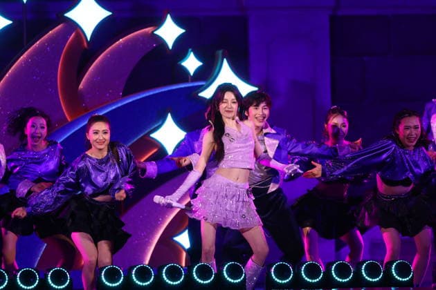 SHANGHAI, CHINA - JUNE 15: Singer Song Yuqi performs on the stage during the special gala for the 10th anniversary celebration of Shanghai Disney Resort on June 15, 2026 in Shanghai, China. A celebration was held on June 15 to mark the 10th anniversary of Shanghai Disney Resort, which first opened to visitors on June 16, 2016.  Copyright: xVCGx 111648593105