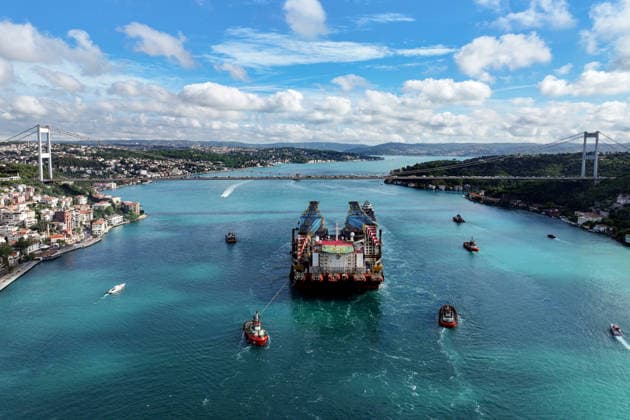 World s 3rd-largest semi-submersible crane vessel transits Bosphorus Strait ISTANBUL, TURKIYE - JUNE 17: An aerial view of the Saipem 7000, the world s third-largest semi-submersible crane vessel used in natural gas pipeline construction, as it transits the Bosphorus near the Fatih Sultan Mehmet Bridge during its voyage from Libya to Romania in Istanbul, Turkiye, on June 17, 2026. Cemal Yurttas Anadolu Istanbul Turkey. Editorial use only. Please get in touch for any other usage.  Copyright: x2026xAnadoluxCemalxYurttasx