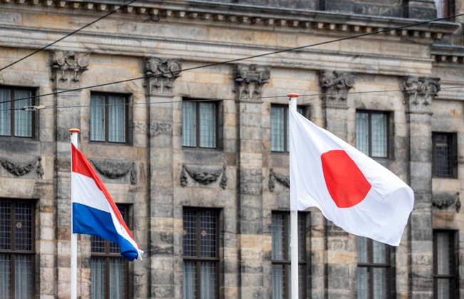 Amsterdam The Netherlands 17th June 2026 State visit of Emperor Naruhito of Japan. Impressions around the Dam around the Koninklijke Paleis Dutch and Japanese flags