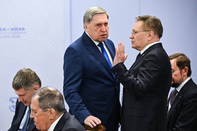 RUSSIA, REPUBLIC OF TATARSTAN - JUNE 17, 2026: Rosatom State Corporation Director General Alexei Likhachev and Russian President Putin s adviser Yuri Ushakov (R-L front) are seen at the 2026 Russia-ASEAN Summit at the Kazan Expo Exhibition Centre in Bolshiye Kabany, southeast of Kazan. Sergei Bobylev TASS  93944664
