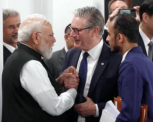 RECORD DATE NOT STATED PM Modi interacts with world leaders at the G7 Summit in France s Evian Evian France , Jun 17 (ANI): Prime Minister Narendra Modi in conversation with British Prime Minister Keir Starmer during the G7 Summit, in Evian on Wednesday. External Affairs Minister S. Jaishankar also present. (DD ANI Video Grab) Evian France Copyright: xANIx ANI_20260617319