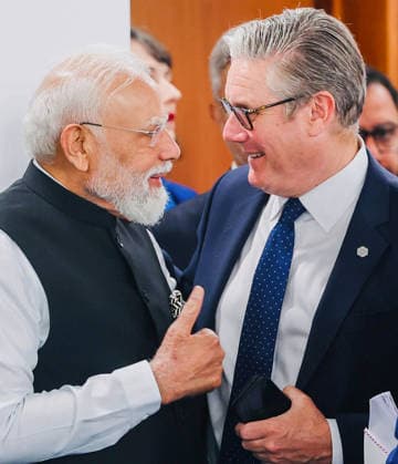 RECORD DATE NOT STATED PM Modi & British PM Keir Starmer at the G7 Summit; India-UK Comprehensive Economic & Trade Agreement announced Evian France , Jun 17 (ANI): Prime Minister Narendra Modi and the United Kingdom s Prime Minister Keir Starmer interact as they announce the India-UK Comprehensive Economic and Trade Agreement during the G7 Summit, in Evian on Wednesday. (@narendramodi X ANI Photo) Evian France Copyright: xANIx ANI_20260617437