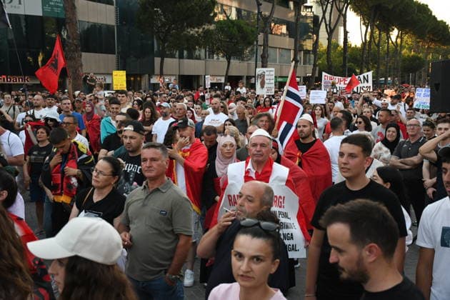 Anti-tourism project protests continue for 18th day in Albania TIRANA, ALBANIA - JUNE 17: Protests against a planned tourism project in the Zvernec area of the coastal city of Vlora continue for a 18th consecutive day in Tirana, Albania on June 17, 2026. Demonstrators gathered in Skanderbeg Square under the slogan Albania is not for sale, with a large number of participants joining the rally. Protesters opposed the reported sale of a beach in Zvernec as part of a tourism project allegedly linked to Ivanka Trump and Jared Kushner. Carrying banners, placards, and Albanian flags, demonstrators marched along the Boulevard of the Martyrs of the Nation toward the Prime Minister’s Office. Olsi Shehu Anadolu Tirana Albania. Editorial use only.  Copyright: x2026xAnadoluxOlsixShehux