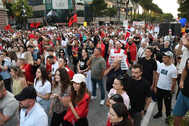 Anti-tourism project protests continue for 18th day in Albania TIRANA, ALBANIA - JUNE 17: Protests against a planned tourism project in the Zvernec area of the coastal city of Vlora continue for a 18th consecutive day in Tirana, Albania on June 17, 2026. Demonstrators gathered in Skanderbeg Square under the slogan Albania is not for sale, with a large number of participants joining the rally. Protesters opposed the reported sale of a beach in Zvernec as part of a tourism project allegedly linked to Ivanka Trump and Jared Kushner. Carrying banners, placards, and Albanian flags, demonstrators marched along the Boulevard of the Martyrs of the Nation toward the Prime Minister’s Office. Olsi Shehu Anadolu Tirana Albania. Editorial use only.  Copyright: x2026xAnadoluxOlsixShehux