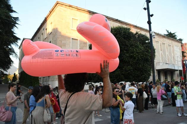 Anti-tourism project protests continue for 18th day in Albania TIRANA, ALBANIA - JUNE 17: Protests against a planned tourism project in the Zvernec area of the coastal city of Vlora continue for a 18th consecutive day in Tirana, Albania on June 17, 2026. Demonstrators gathered in Skanderbeg Square under the slogan Albania is not for sale, with a large number of participants joining the rally. Protesters opposed the reported sale of a beach in Zvernec as part of a tourism project allegedly linked to Ivanka Trump and Jared Kushner. Carrying banners, placards, and Albanian flags, demonstrators marched along the Boulevard of the Martyrs of the Nation toward the Prime Minister’s Office. Olsi Shehu Anadolu Tirana Albania. Editorial use only.  Copyright: x2026xAnadoluxOlsixShehux