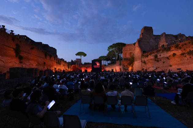 IPA85796823 - The Silent Storm, a shared, collective reading experience conceived by Alessandro Baricco at the Palatino Stadium in Rome. Thousands of people read Fyodor Dostoevsky™s *White Nights* at the same time.  Copyright: xMatteoxNardonex xx 85796823