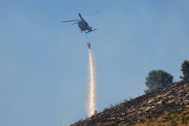 Wildfire continues to burn in Sicily s Trapani region as aerial response intensifies TRAPANI, ITALY - JUNE 17: Firefighting aircraft and helicopters operate to extinguish a wildfire that broke out in a maquis area near the Grande Montagna location in Trapani, on the west of Italy s Sicily Island, on June 17, 2026. The wildfire, which started yesterday afternoon, continues to spread despite ongoing aerial and ground efforts. Alberto Lo Bianco Anadolu Trapani Italy. Editorial use only. Please get in touch for any other usage.  Copyright: x2026xAnadoluxAlbertoxLoxBiancox
