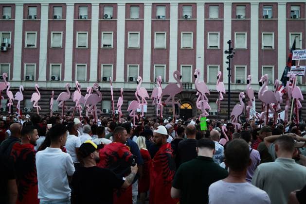 Protesters Rally Against Proposed Tourism Development in Tirana TIRANA, ALBANIA JUNE 17, 2026: Environmental activists, civil society groups, families and young people take part in the eighteenth consecutive day of demonstrations against a proposed luxury tourism development project linked to Jared Kushner. Protesters marched through central Tirana carrying banners, placards and Albanian flags while calling for the cancellation of the project and raising concerns about its potential environmental impact. Flamingo-themed installations and symbolic displays featured prominently during the rally, reflecting a growing symbol of the protest movement. Tirana Albania Copyright: x xVlasovxSulajx xJNAxPressx