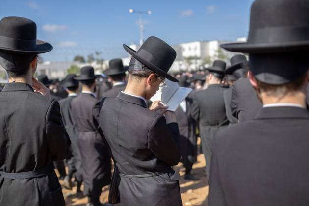 Ultra-Orthodox Jews opposing compulsory military service protest outside an Israeli prison KFAR YONA, ISRAEL - JUNE 17: Thousands of demonstrators gather outside the Beit Lid military prison, calling for the release of an Ultra-Orthodox youth who was arrested for refusing compulsory military service in Kfar Yona, Israel on June 17, 2026. Israeli forces took extensive security measures around the prison during the protest. photo by Roman Levin JNA Press (Photo by Roman Levin JNA Press via Nexpher Images) Kfar Yona