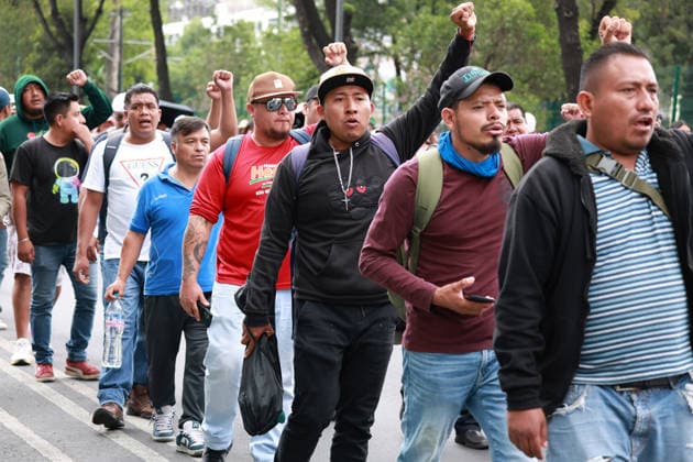 CNTE teachers rally toward Banorte Stadium in Mexico City MEXICO CITY, MEXICO - JUNE 17: CNTE teachers raise their fists during a rally toward Banorte Stadium, in Mexico City, Mexico on June 17, 2026. Members of National Coordination of Education Workers (CNTE) held a rally toward Banorte Stadium hours before the Uzbekistan v Colombia match following failed talks with the Mexican government. Daniel Cardenas Anadolu Mexico City Mexico. Editorial use only. Please get in touch for any other usage.  Copyright: x2026xAnadoluxDanielxCardenasx