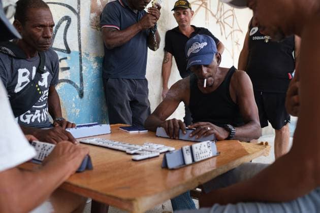 CUBA-HAVANA SOCIAL CRISIS AND WORLD CUP HAVANA, CUBA - JUNE 16, 2026: A group of men gather around a wooden table to play dominoes on a street in Havana, Cuba, on June 16, 2026. Street games remain a cornerstone of neighborhood socialization and a traditional means of passing the time amidst widespread unemployment and inflation. (Photo by Pablo Miranzo JNA Press via Nexpher Images) HAVANA