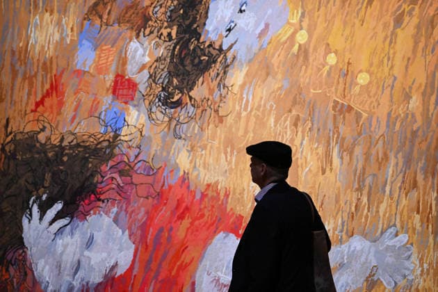 ARTHUR BOYD TAPESTRIES EXHIBITION, A guest takes a look at a tapestry during a media preview of a major winter exhibition ˜Arthur Boyd: Tapestries™ at the National Gallery of Australia in Canberra, Thursday, June 18, 2026. At 2.5 by 3.4 metres, each tapestry features a scene from the life of St Francis of Assisi, one of the most venerated figures in history. ( NO ARCHIVING CANBERRA AUSTRALIAN CAPITAL TERRITORY AUSTRALIA  Copyright: xLUKASxCOCHx 20260618168620755914