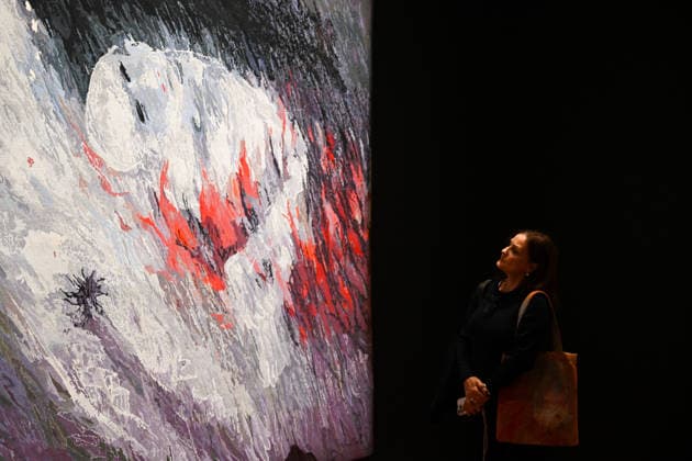 ARTHUR BOYD TAPESTRIES EXHIBITION, A guest takes a look at tapestries during a media preview of a major winter exhibition ˜Arthur Boyd: Tapestries™ at the National Gallery of Australia in Canberra, Thursday, June 18, 2026. At 2.5 by 3.4 metres, each tapestry features a scene from the life of St Francis of Assisi, one of the most venerated figures in history. ( NO ARCHIVING CANBERRA AUSTRALIAN CAPITAL TERRITORY AUSTRALIA  Copyright: xLUKASxCOCHx 20260618192379753198