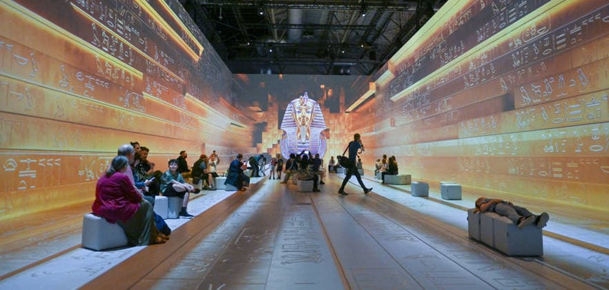 Tutankhamun The Immersive Experience, NEC, Birmingham UK Tutankhamun The Immersive Experience arrives at the NEC, Birmingham UK for 12 weeks. Following hugely successful runs in cities such as Madrid, Hamburg, Cairo, Sao Paulo, Barcelona, Vienna, Malmö, London, Glasgow and Stockholm, the groundbreaking 2,000 square metre exhibition invites visitors to step back in time and embark upon an exhilarating journey through ancient Egypt, discovering the myths and mysteries surrounding Pharaoh Tutankhamun. Created in collaboration with Egyptologists and historians, the exhibition features one of Europe™s most expansive immersive video mapping rooms with projections on 8-metre-high surfaces. Blending cutting-edge technology with Egyptian hi  Copyright: xJulesxAnnanx xAvalonx 1110839926