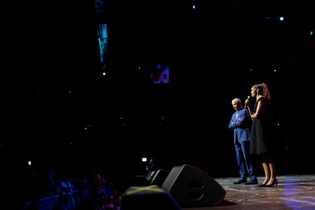 Former President Barack Obama and former first lady Michelle Obama appear on stage as they surprised administration and campaign alumni in Chicago ahead of the dedication ceremony of the Obama Presidential Center, Wednesday, June 17, 2026. Pool  CHX20260617204 PabloxMartinezxMonsivais
