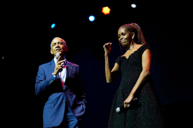 Former President Barack Obama and former first lady Michelle Obama appear on stage as they surprised administration and campaign alumni in Chicago ahead of the dedication ceremony of the Obama Presidential Center, Wednesday, June 17, 2026. Pool  CHX20260617213 PabloxMartinezxMonsivais