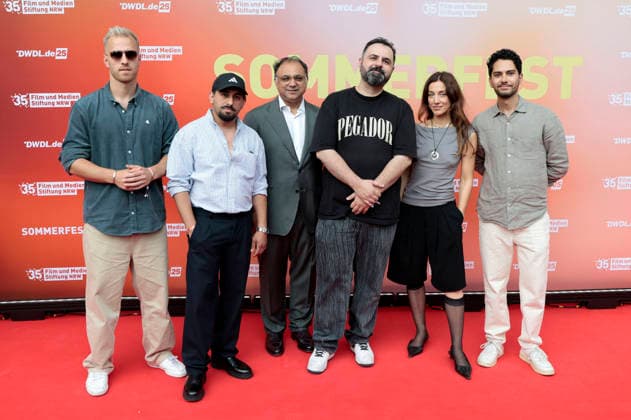 Walid Nakschbandi, Bilal Bahadir und Cagdas Eren Yüksel mit Gästen beim Sommerfest zum 35-jährigen Bestehen der Film- und Medienstiftung NRW im Park CafÃ . Köln, 17.06.2026 *** Walid Nakschbandi, Bilal Bahadir, and Cagdas Eren Yüksel with guests at the summer celebration marking the 35th anniversary of the Film and Media Foundation NRW at Park Café in Cologne, June 17, 2026,detected_source_language Foto:xR.xSchmiegeltx xFuturexImagex nrw_sommerfest_6661