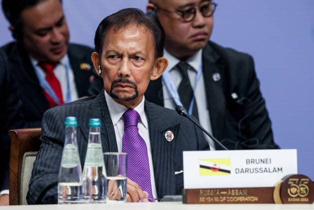 RUSSIA, REPUBLIC OF TATARSTAN - JUNE 18, 2026: Sultan of Brunei Darussalam Hassanal Bolkiah attends the Russia-ASEAN Summit at the Kazan Expo Exhibition Centre in Bolshiye Kabany. Mikhail Metzel Russian President  93975601