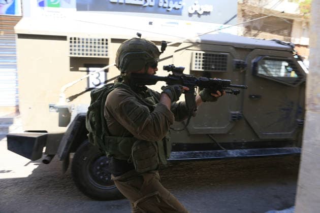 Israeli army raids Balata refugee camp near Nablus Israeli army forces raid Balata refugee camp, east of Nablus in the West Bank, on June 18, 2026. According to local sources, Israeli forces stormed the market during a military operation and detained several Palestinians. Photo by Mohammed Nasser apaimages Nablus West Bank Palestinian Territory 180626_Nablus_MN_00(6) Copyright: xapaimagesxMohammedxNasserx xapaimagesx