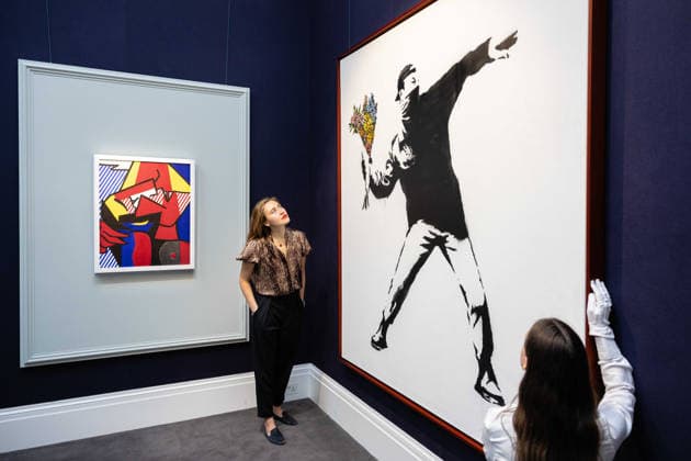 Sotheby s London Modern and Contemporary June Sales Preview, London, UK 18 June 2026 Banksy s Love Is In The Air (life size), estimated at Â£3,500,000 - 5,500,000, (left) and Roy Lichtenstein s Despair, estimated at Â£1,000,000-1,500,000, (right) at Sotheby s London, Mayfair, London, UK, on 18 June 2026. The work is described as the largest and most formidable iteration of this image to appear on the market, and will be offered at auction on 24 June 2026 alongside the celebrated Lewis Collection., Credit:Pete Speller Avalon  Copyright: xPetexSpellerx xAvalonx 1111012590