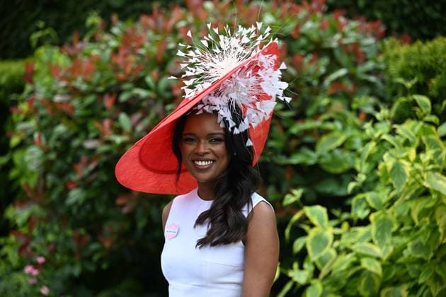 Royal Ascot 2026 BERKSHIRE, UNITED KINGDOM - JUNE 18: Visitors wearing elaborate hats and elegant outfits attend the third day of the traditional Royal Ascot horse racing event, held in the United Kingdom since 1711, at Ascot Racecourse in Berkshire, United Kingdom on June 18, 2026. Rasid Necati Aslim Anadolu Berkshire United Kingdom. Editorial use only. Please get in touch for any other usage.  Copyright: x2026xAnadoluxRasidxNecatixAslimx