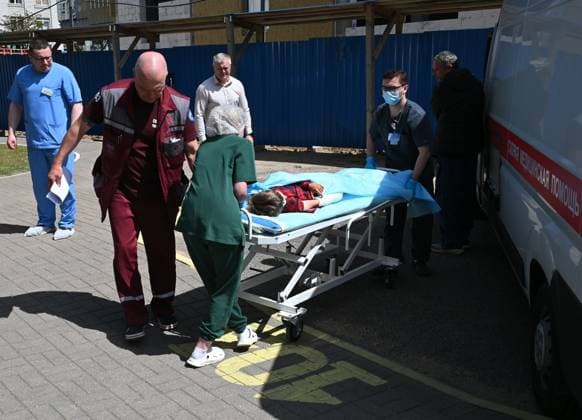 Belarus Russia Ukraine Bus Attack Victims 9191475 18.06.2026 Medics wheel a child injured in a Ukrainian drone strike on a passenger bus carrying Belarusian citizens in Russia™s Bryansk region outside the Republican Scientific and Practical Centre for Pediatric Surgery in Minsk, Belarus. RIA Novosti Sputnik Minsk Belarus  Copyright: xRIAxNovostix