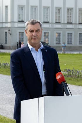 Munich, Bavaria, Germany - June 18, 2026: Dr. Markus Söder (CSU, Minister-President of Bavaria). Press conference held by the top sports federations in front of Nymphenburg Palace to present Munich™s expanded bid proposal, as well as the unique features and opportunities the state capital offers as a national candidate for the Summer Olympic Games *** Dr. Markus Söder (CSU, Ministerpräsident Bayern) . Pressekonferenz der Spitzensportverbände vor Schloss Nymphenburg zur Vorstellung des erweiterten Münchner Bewerbungskonzepts sowie der Besonderheiten und Chancen der Landeshauptstadt als nationaler Bewerber für die Olympischen Sommerspiele