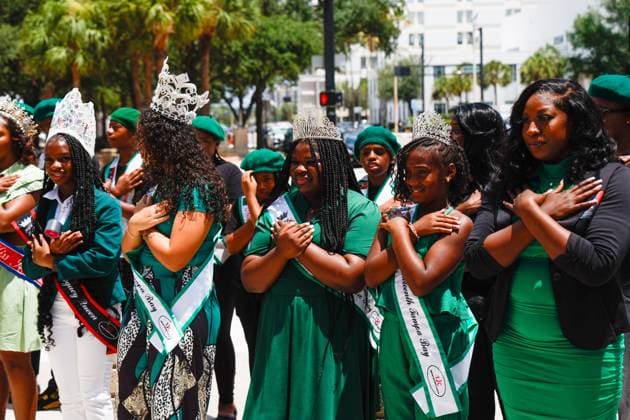 June 18, 2026, Tampa, Florida, USA: The Juneteenth Royal Court watches the Juneteenth flag get unveiled during the annual Juneteenth Flag-Raising ceremony outside the Fred B. Karl County Center on Thursday, June 18, 2026, in Tampa. Tampa USA - ZUMAs70_ 20260618_zan_s70_003 Copyright: xJeffereexWoox