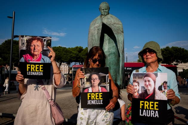 June 18, 2026, Rome, Rm, Italy: Amnesty International launches a permanent national mobilization with protests across Italy in support of the 10 people from the Global Sumud Land Convoy who have been held captive in Libya for 24 days. In Rome, activists gather in the square in front of Termini Station, near the statue of Pope John Paul II. Rome Italy - ZUMAg256 20260618_znp_g256_005 Copyright: xMarcoxDixGianvitox
