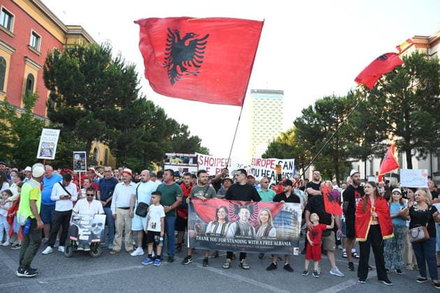 Anti-tourism project protests continue for 19th day in Albania TIRANA, ALBANIA - JUNE 18: Protests against a planned tourism project in the Zvernec area of the coastal city of Vlora continue for a 19th consecutive day in Tirana, Albania on June 18, 2026. Demonstrators gathered in Skanderbeg Square under the slogan Albania is not for sale, with a large number of participants joining the rally. Protesters opposed the reported sale of a beach in Zvernec as part of a tourism project allegedly linked to Ivanka Trump and Jared Kushner. Carrying banners, placards, and Albanian flags, demonstrators marched along the Boulevard of the Martyrs of the Nation toward the Prime Minister’s Office. Olsi Shehu Anadolu Tirana Albania. Editorial use only.  Copyright: x2026xAnadoluxOlsixShehux