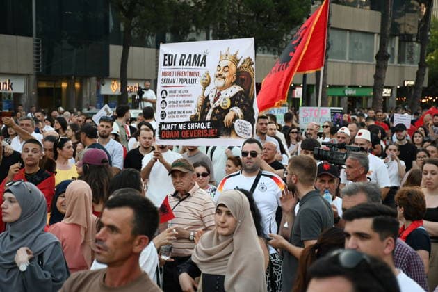 Anti-tourism project protests continue for 19th day in Albania TIRANA, ALBANIA - JUNE 18: Protests against a planned tourism project in the Zvernec area of the coastal city of Vlora continue for a 19th consecutive day in Tirana, Albania on June 18, 2026. Demonstrators gathered in Skanderbeg Square under the slogan Albania is not for sale, with a large number of participants joining the rally. Protesters opposed the reported sale of a beach in Zvernec as part of a tourism project allegedly linked to Ivanka Trump and Jared Kushner. Carrying banners, placards, and Albanian flags, demonstrators marched along the Boulevard of the Martyrs of the Nation toward the Prime Minister’s Office. Olsi Shehu Anadolu Tirana Albania. Editorial use only.  Copyright: x2026xAnadoluxOlsixShehux