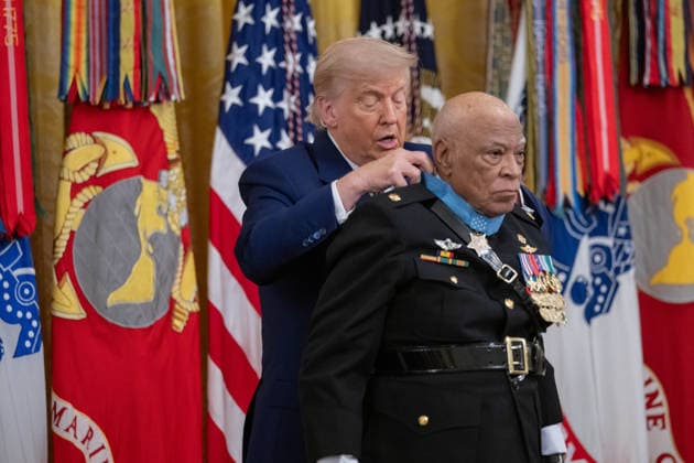 June 18, 2026, Washington, Disitrirct Of Columbia, United States: Retired U.S. Marine Corps Major James Capers, Jr. receives the Medal of Honor during a ceremony hosted by President Donald Trump in the East Room of the White House in Washington, D.C., on Thursday, June 18, 2026. Capers was recognized for acts of gallantry and intrepidity above and beyond the call of duty while serving in the Republic of Vietnam from March 31 to April 3, 1967. Washington United States - ZUMAk206 20260618_znp_k206_020 Copyright: xMattxKaminskyx