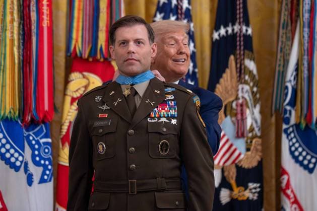 June 18, 2026, Washington, District Of Columbia, USA: President DONALD TRUMP presents the Medal of Honor to Major NICHOLAS DOCKERY, U.S. Army (Ret.), during a Medal of Honor ceremony in the East Room of the White House in Washington DC. Washington USA - ZUMAs365 20260618_znp_s365_032 Copyright: xJoeyxSussmanx