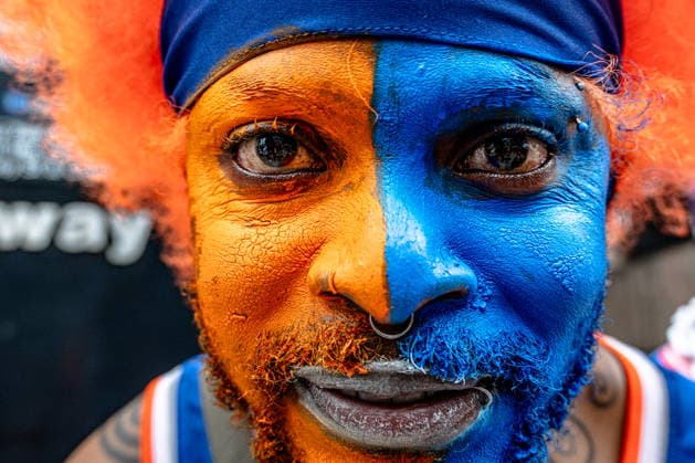 June 18, 2026, New York, New York, USA: A Knicks fan paints his face in celebration as the New York Knicks Championship ticker tape parade and victory rally celebrating winning the 2026 NBA Finals on June 18, 2026. The New York Knicks defeated the San Antonio Spurs in five games to win their first NBA finals in 53 years. New York USA  - ZUMAb230 20260618_znp_b230_014 Copyright: xLauraxBrettx