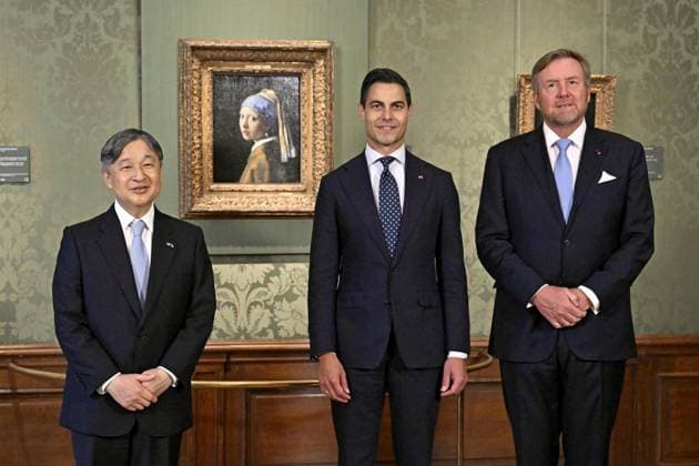 Japan s emperor in The Hague (From L) Emperor Naruhito of Japan, Dutch Prime Minister Rob Jetten and King Willem-Alexander of the Netherlands pose for a photo in front of Johannes Vermeer s Girl with a Pearl Earring at the Mauritshuis in The Hague, the Netherlands, on June 18, 2026, during the emperor s state visit.  A14AA0005619443P