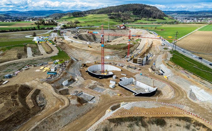 Drone footage of the major infrastructure construction site in G Glattfelden, Switzerland, 23rd Mar 2025: Drone footage of the major construction site at the Chrüzstrasse roundabout. The expansion of Schaffhauserstrasse in the Zurich lowlands shows the current construction progress and the future traffic flow from above. *** Drone footage of the major infrastructure construction site in G Glattfelden, Switzerland, March 23, 2025. Drone footage of the major construction site at the Chrüzstrasse roundabout. The expansion of Schaffhauserstrasse in the Zurich lowlands shows the current construction progress and the future traffic flow from above.,detected_source_language Copyright: xAndreasxHaasx
