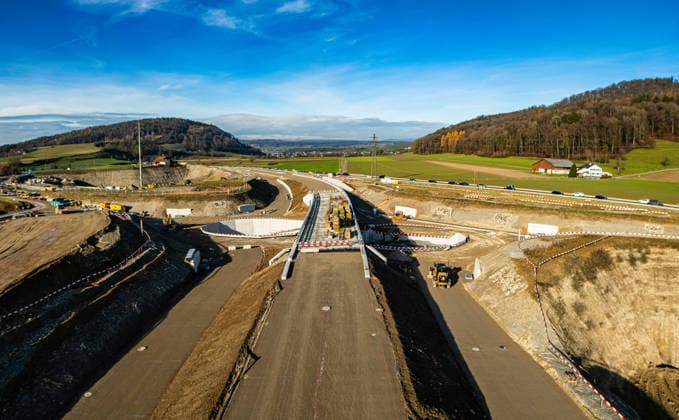 Drone footage of the major infrastructure construction site in G Glattfelden, Switzerland, 29th Nov 2025: Drone footage of the major construction site at the Chrüzstrasse roundabout. The expansion of Schaffhauserstrasse in the Zurich lowlands shows the current construction progress and the future traffic flow from above. *** Drone footage of the major infrastructure construction site in G Glattfelden, Switzerland, November 29, 2025. Drone footage of the major construction site at the Chrüzstrasse roundabout. The expansion of Schaffhauserstrasse in the Zurich lowlands shows the current construction progress and the future traffic flow from above.,detected_source_language Copyright: xAndreasxHaasx