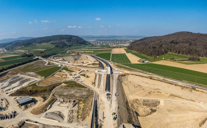 Drone footage of the major infrastructure construction site in G Glattfelden, Switzerland, 22nd Mar 2026: Drone footage of the major construction site at the Chrüzstrasse roundabout. The expansion of Schaffhauserstrasse in the Zurich lowlands shows the current construction progress and the future traffic flow from above. *** Drone footage of the major infrastructure construction site in G Glattfelden, Switzerland, March 22, 2026. Drone footage of the major construction site at the Chrüzstrasse roundabout. The expansion of Schaffhauserstrasse in the Zurich lowlands shows the current construction progress and the future traffic flow from above.,detected_source_language Copyright: xAndreasxHaasx